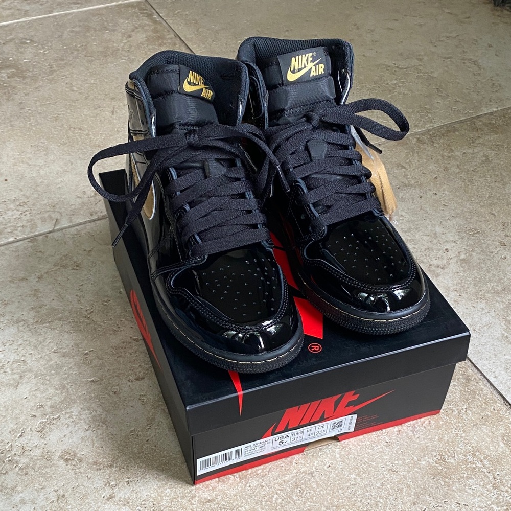 Nike Air boys Black and Gold Sneakers
